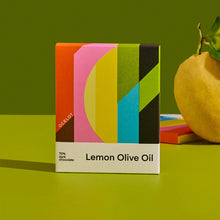 Ocelot Chocolate Lemon Olive Oil White Chocolate Bar 70g with lemon in the background