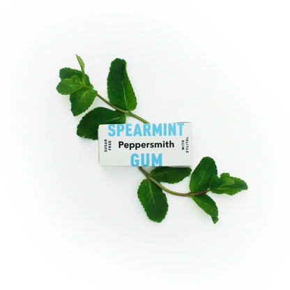 Peppersmith - Vegan Spearmint Gum 15g on a stalk of spearmint