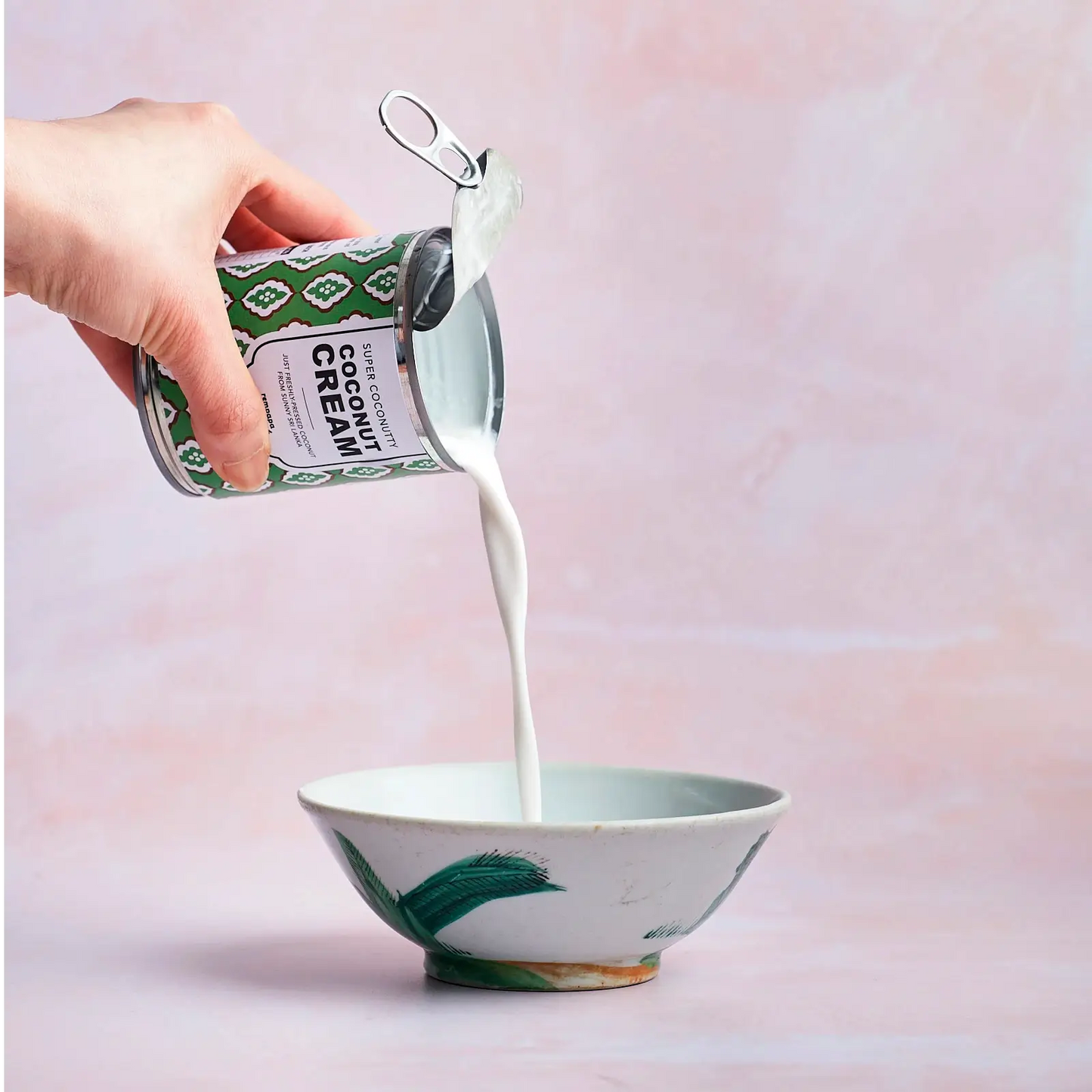 Rempapa Super Coconutty Coconut Cream 225ml poured into a bowl
