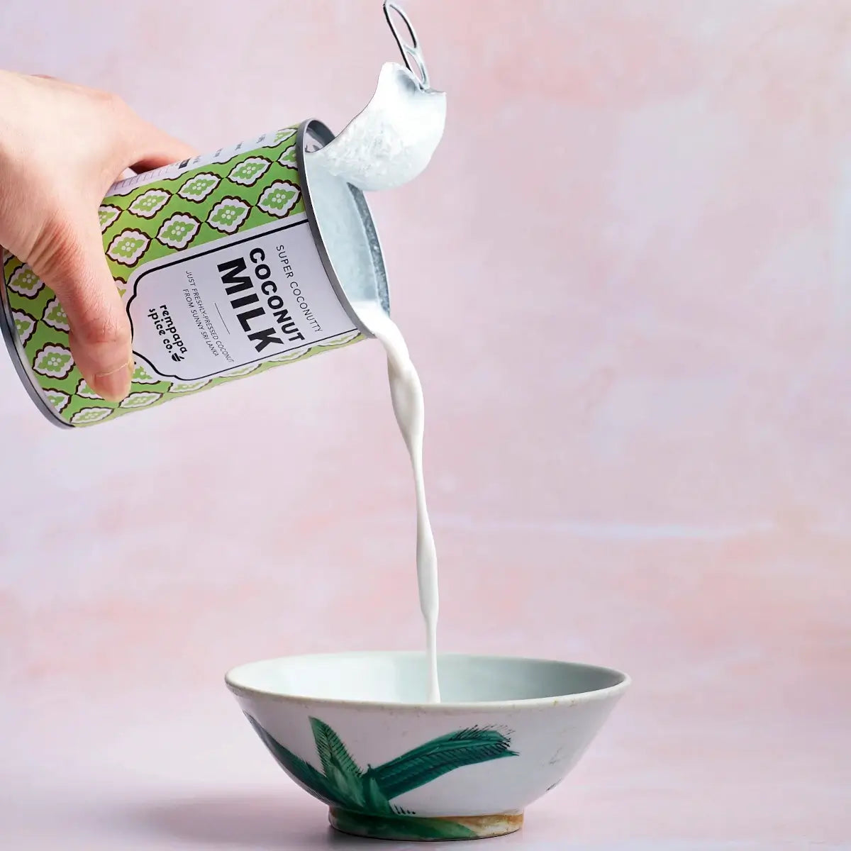 Rempapa Super Coconutty Coconut Milk 400ml poured into a bowl