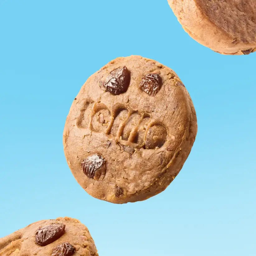 Teffie - Cinnamon Sultana Superblend Bites on a blue background