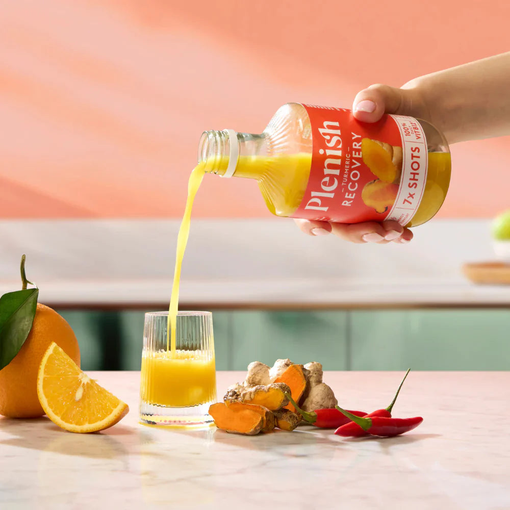 Plenish Turmeric Recovery Shots Pack 4 x 420ml Dosing Bottles Pouring