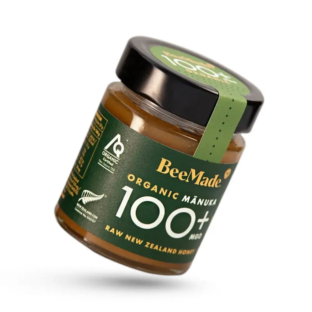 BeeMade - Organic Mànuka Honey MGO 100+ 250g single jar on a diagonal