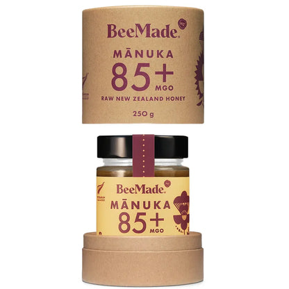 BeeMade - Harvest Mànuka Honey MGO 85+ 250g inside cardboard tube packaging
