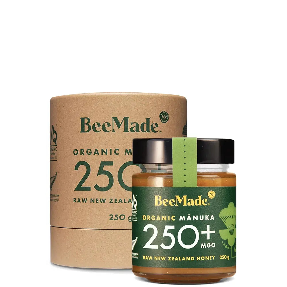BeeMade - Organic Mànuka Honey MGO 250+ 250g next to cardboard tube packaging
