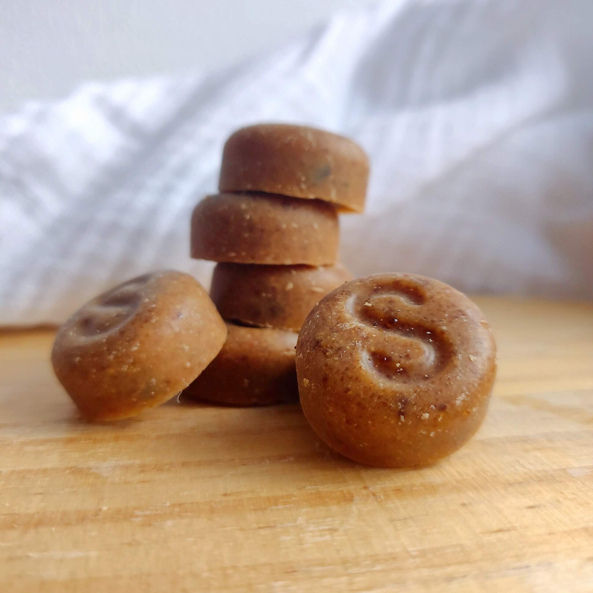 Coco Crunch Peanut Butter Buttons 15 x 20g - Superfoodio. Pile of buttons